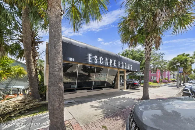 a car parked in front of a house