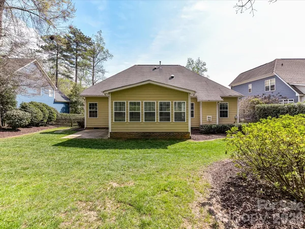 a view of a house with a garden