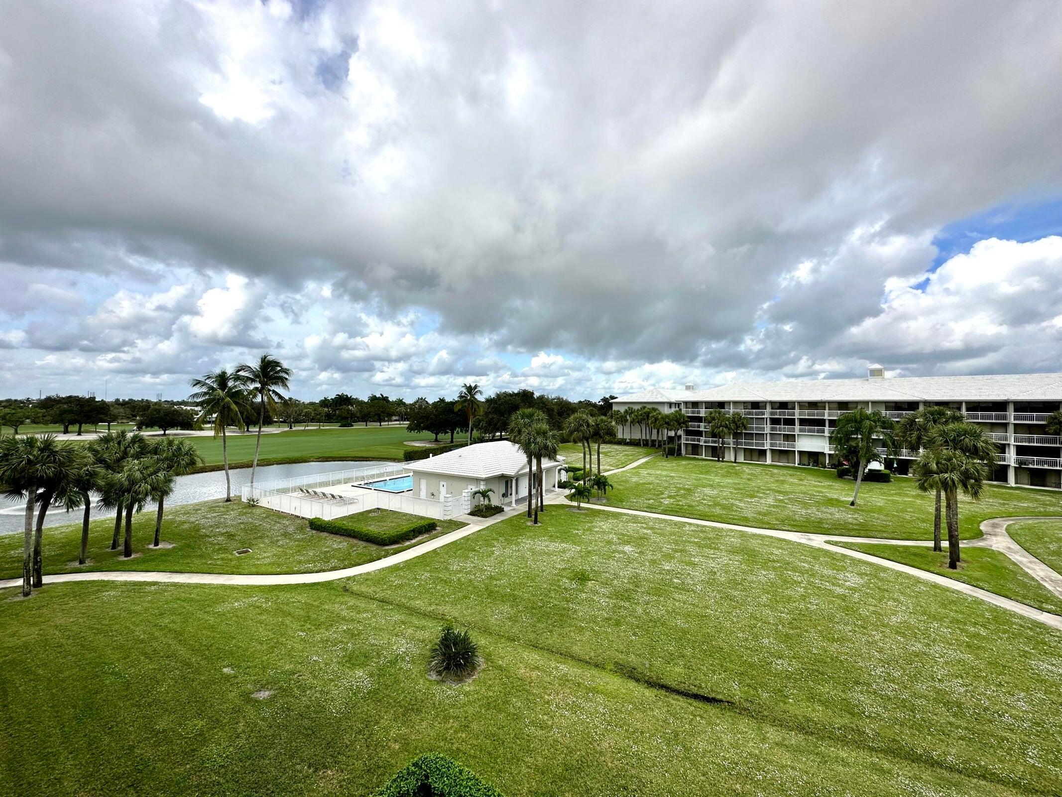 3525 Village Boulevard, Unit 401 West Palm Beach, FL 33409 - Photo 3 of 23 a view of an outdoor space and backyard