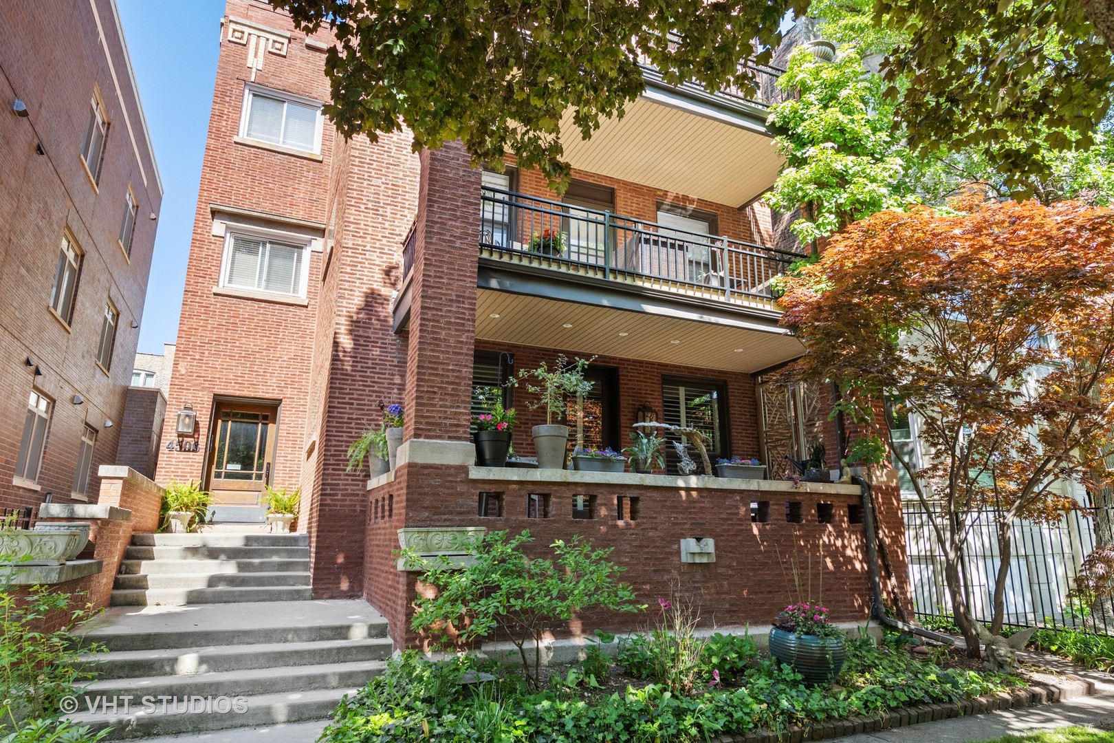 4506 North Beacon Street, Unit 3 Chicago, IL 60640 - Photo 1 of 23 front view of a building with a yard