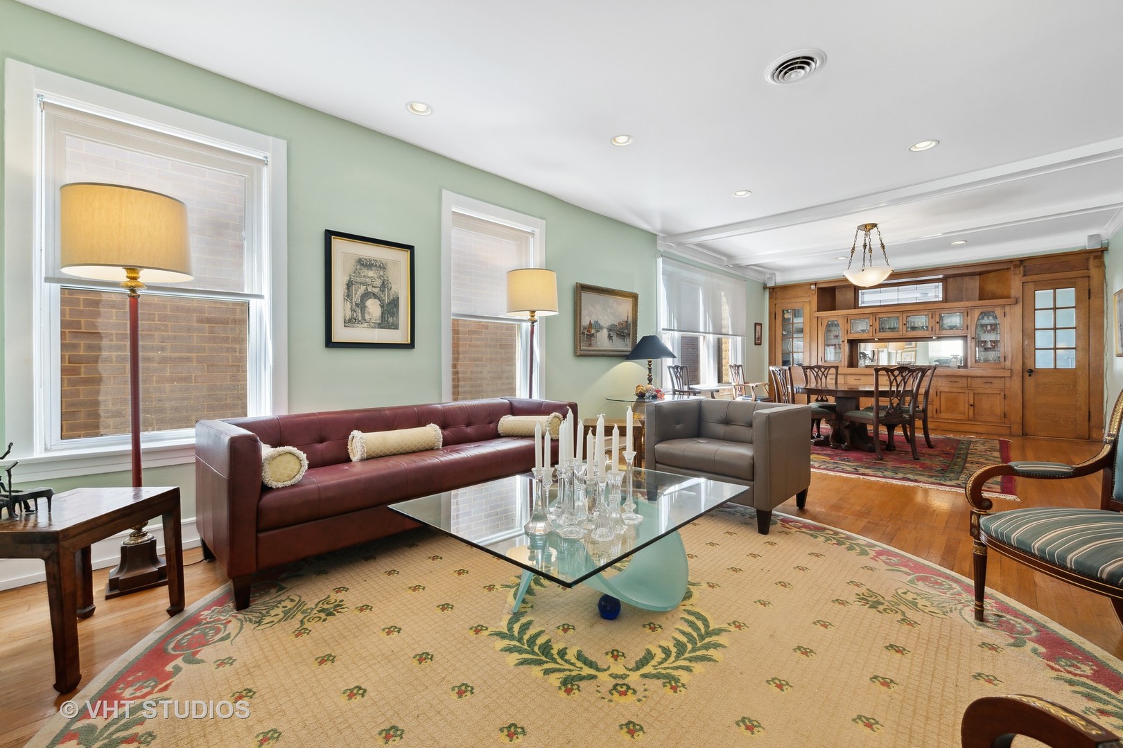 4506 North Beacon Street, Unit 3 Chicago, IL 60640 - Photo 12 of 23 a living room with furniture a rug and a window