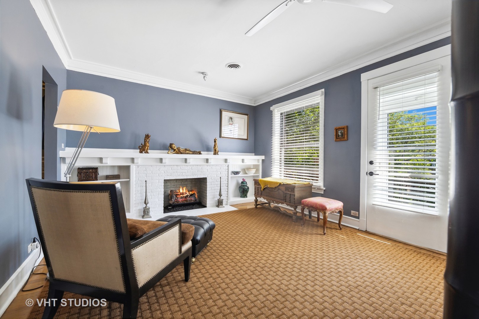 4506 North Beacon Street, Unit 3 Chicago, IL 60640 - Photo 8 of 23 a living room with furniture and a fireplace