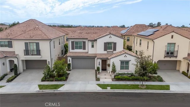 an aerial view of a city with lots of residential buildings