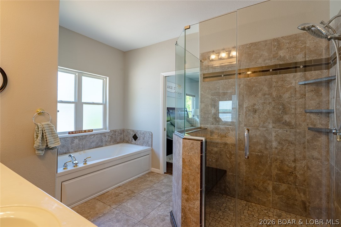 150 Cub Cove Point Camdenton, MO 65020 - Photo 27 of 89 Large tiled shower and separate jetted bath