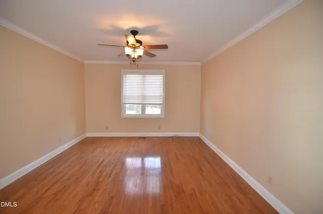 a bathroom with a sink a large mirror and a shower