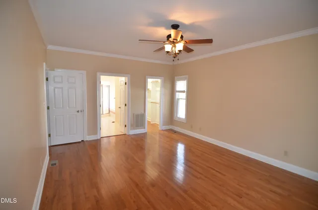 a kitchen with a sink stove and refrigerator