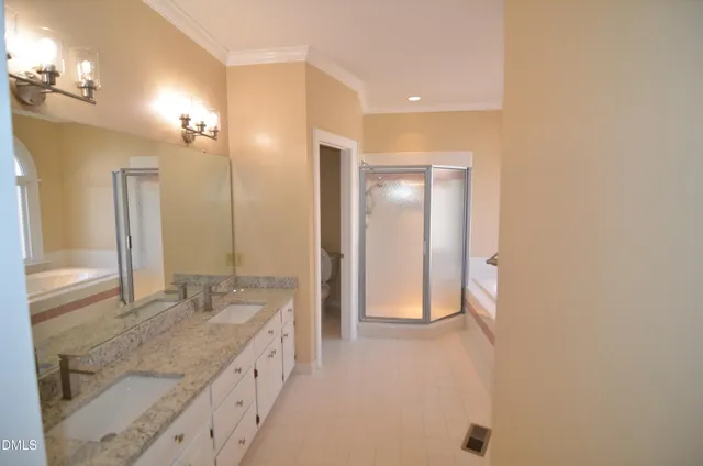 a kitchen with a sink cabinets and window