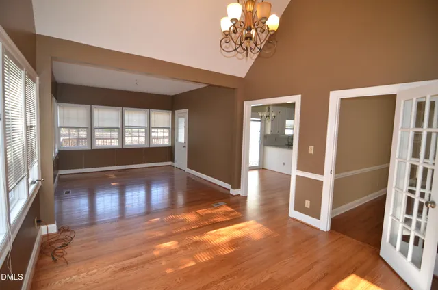 a view of a yard next to a lake