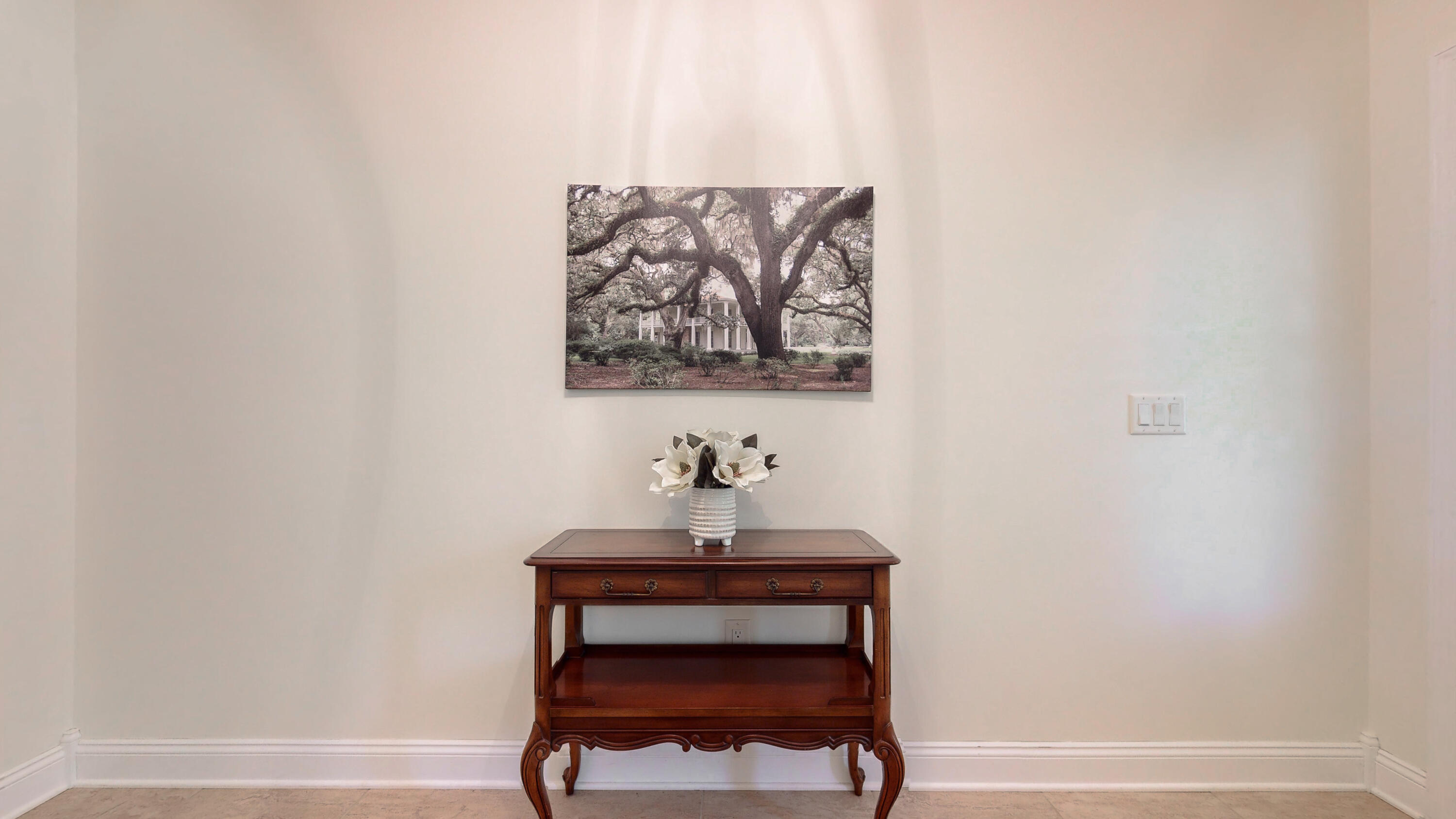 83 Launch Road DeFuniak Springs, FL 32433 - Photo 12 of 62 a room with a table and a painting