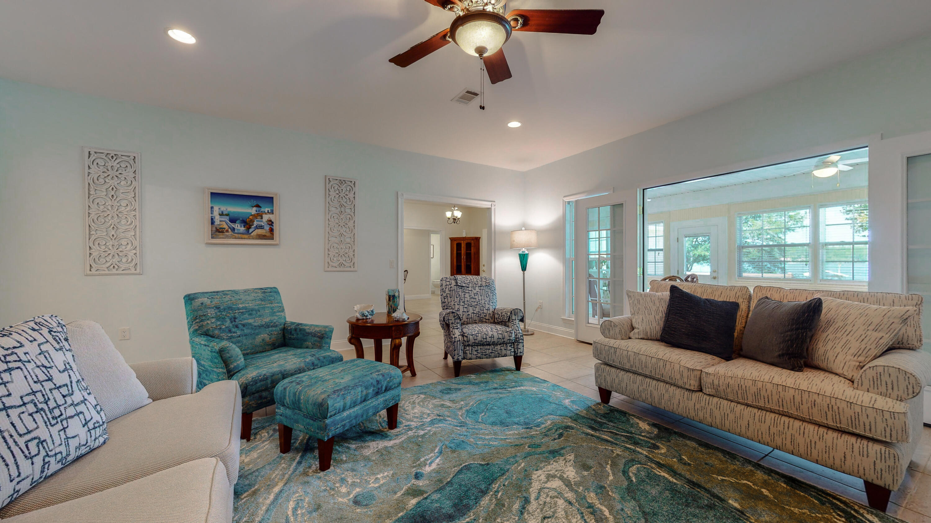 83 Launch Road DeFuniak Springs, FL 32433 - Photo 16 of 62 a living room with furniture and a large window