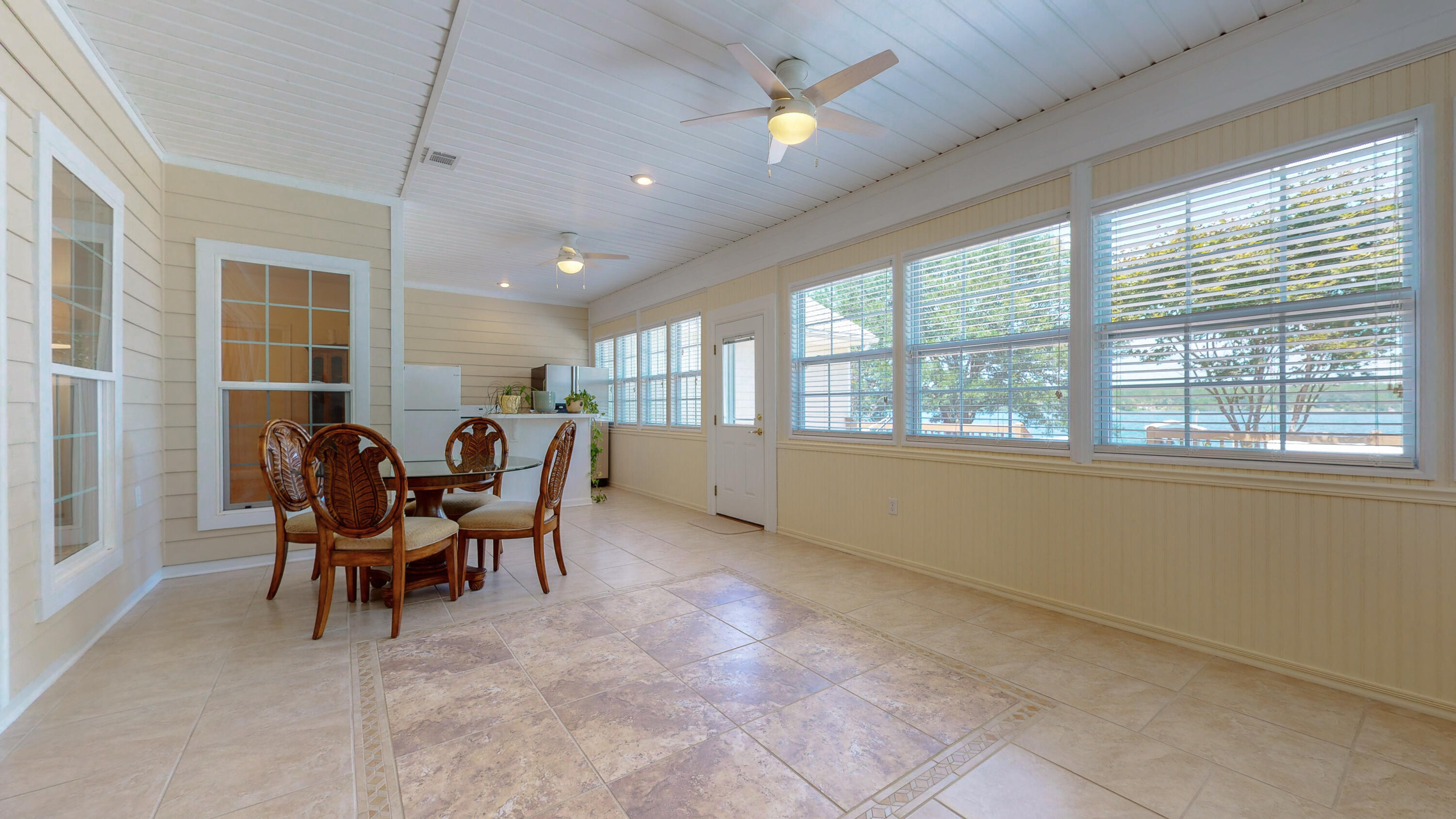 83 Launch Road DeFuniak Springs, FL 32433 - Photo 20 of 62 a view of a dining room with furniture window and outside view