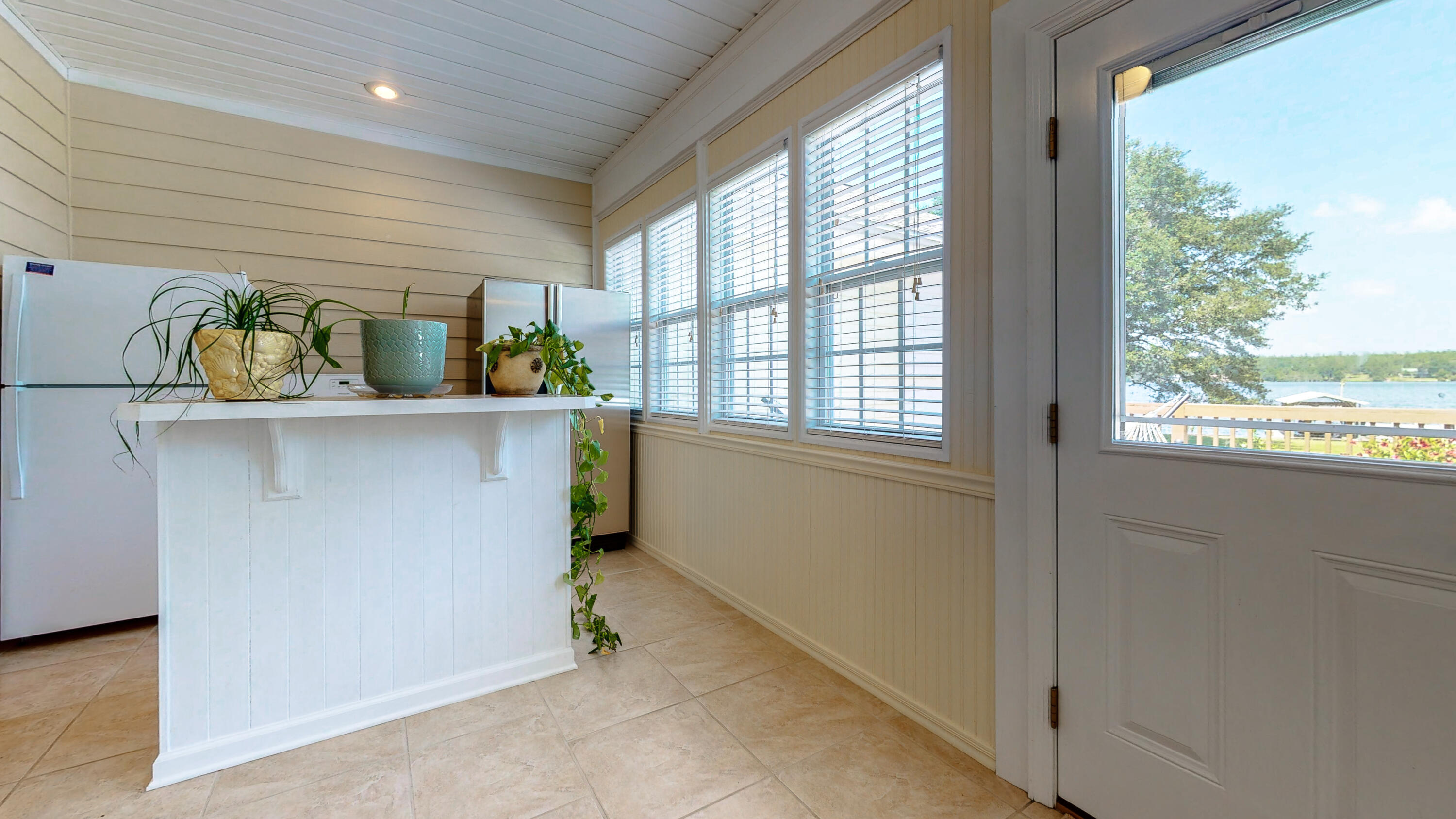 83 Launch Road DeFuniak Springs, FL 32433 - Photo 22 of 62 a kitchen with stainless steel appliances a sink and a window