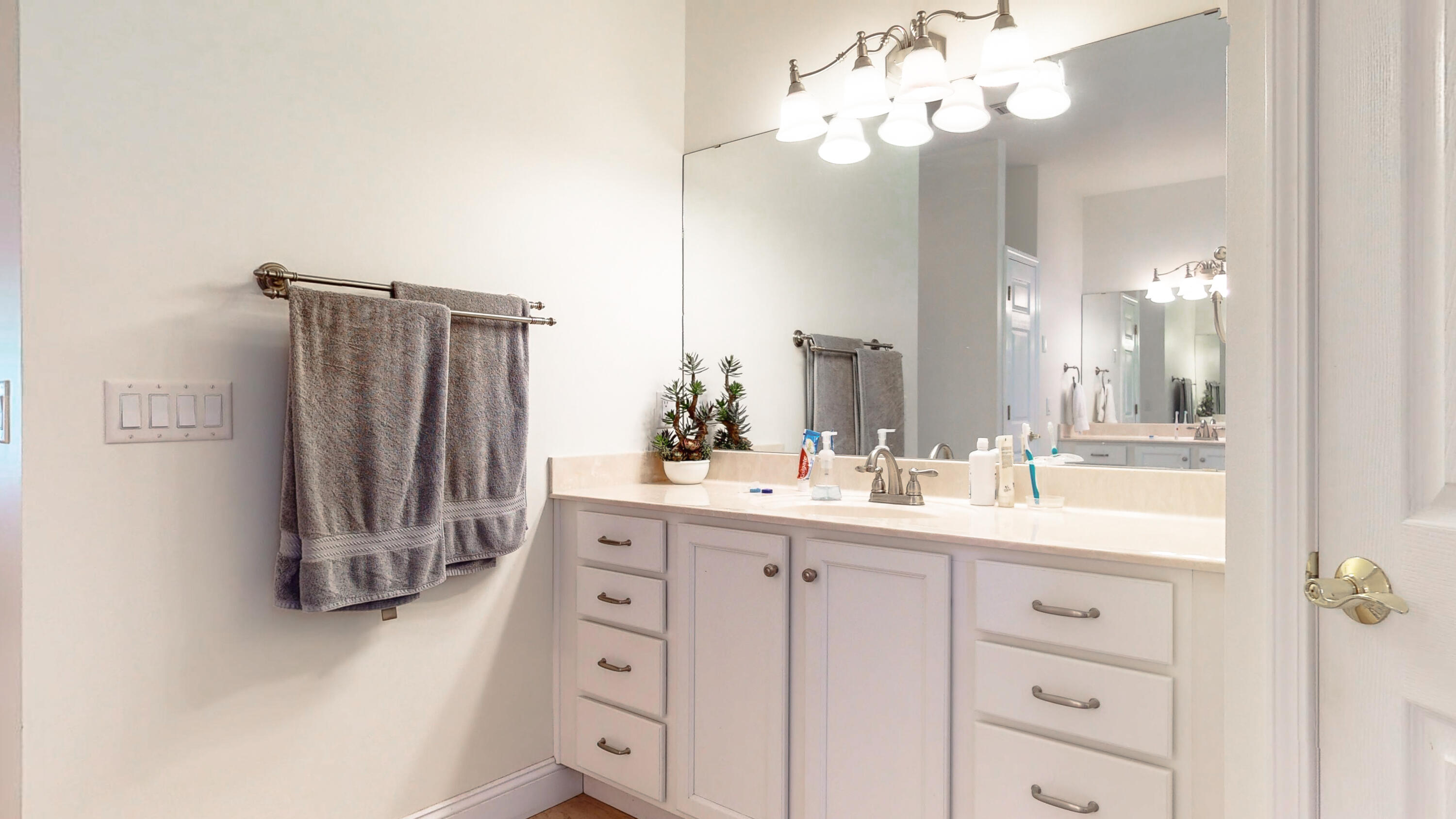 83 Launch Road DeFuniak Springs, FL 32433 - Photo 33 of 62 a bathroom with a sink vanity and a mirror