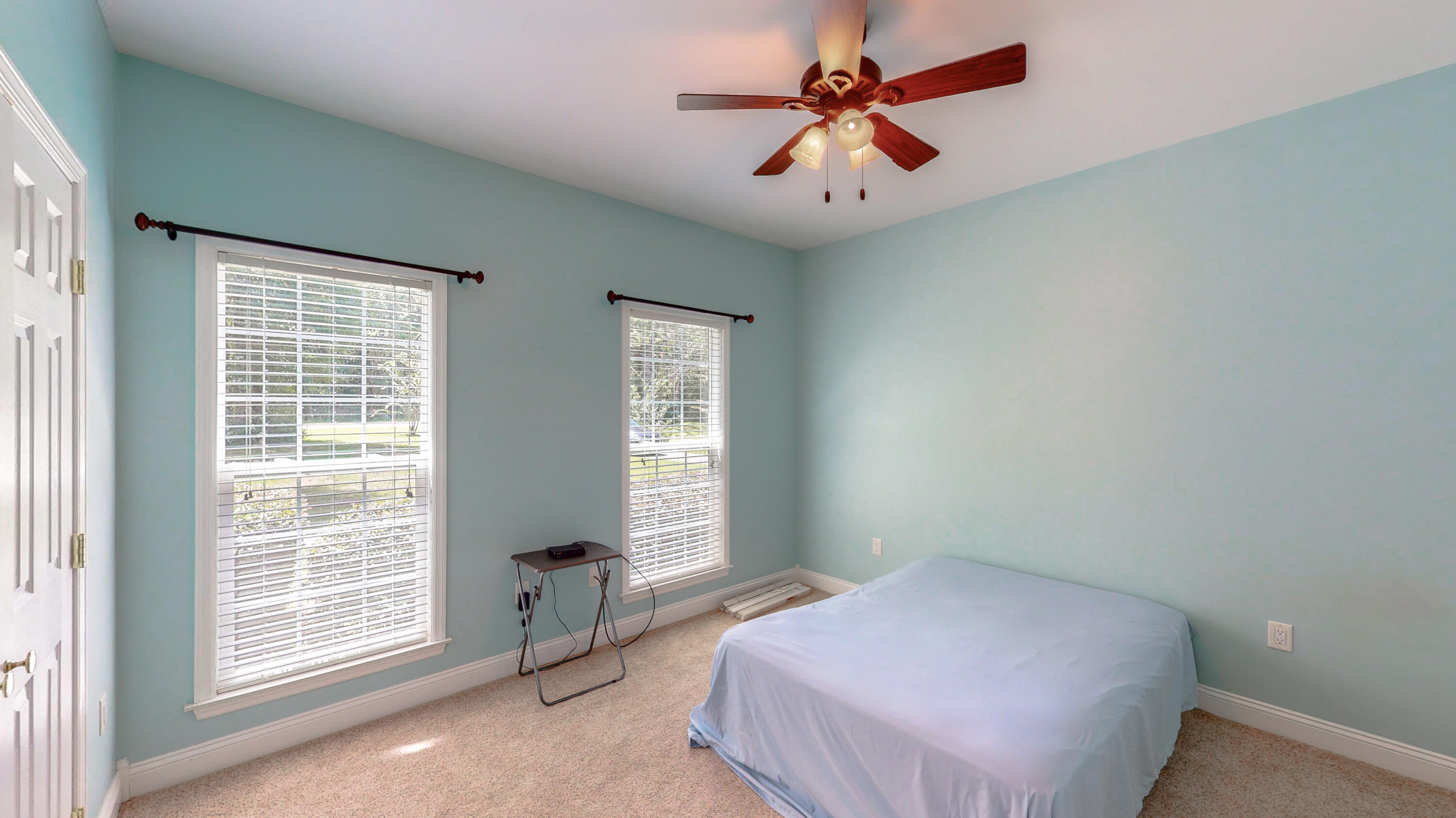 83 Launch Road DeFuniak Springs, FL 32433 - Photo 46 of 62 a bedroom with a bed and a window
