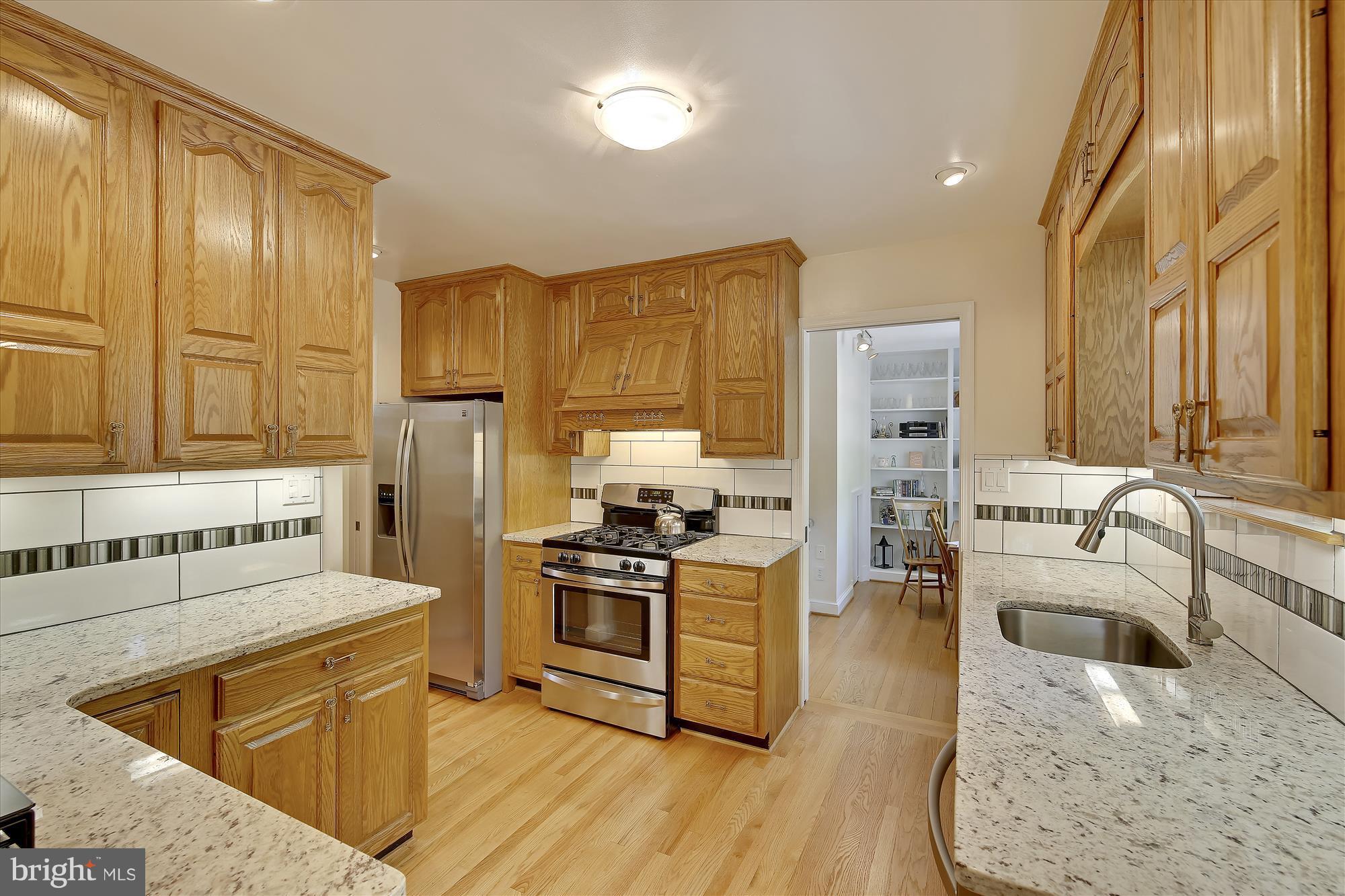 12913 Two Farm Drive Silver Spring, MD 20904 - Photo 5 of 28 Kitchen with granite counters