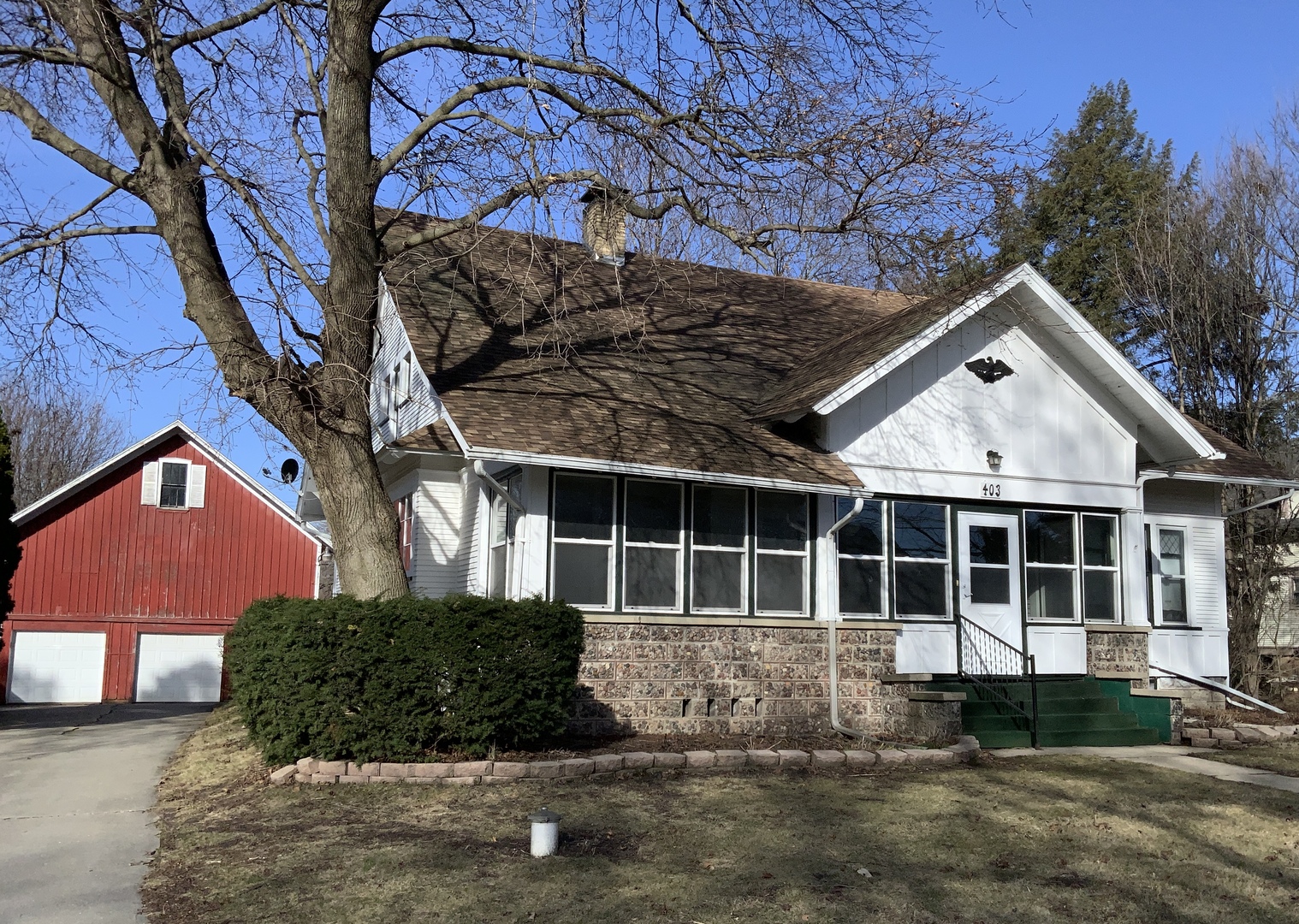 403 Rhodes Avenue Big Rock, IL 60511 - Photo 1 of 48 a front view of a house with a yard