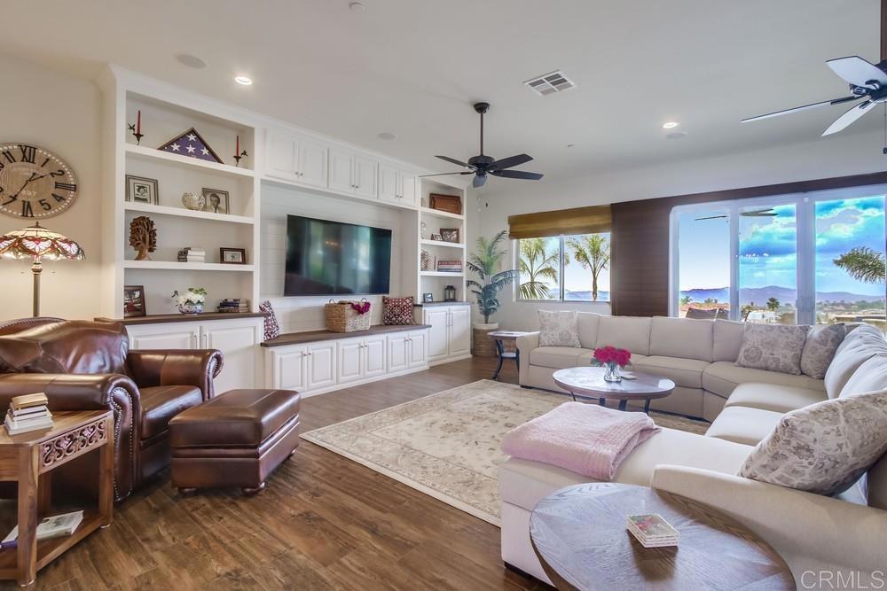2893 Overland Passage Alpine, CA 91901 - Photo 11 of 51 a living room with furniture flat screen tv and large window