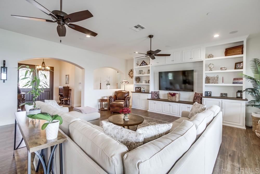 2893 Overland Passage Alpine, CA 91901 - Photo 12 of 51 a living room with furniture and a flat screen tv