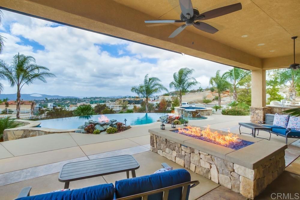 2893 Overland Passage Alpine, CA 91901 - Photo 2 of 51 a view of an outdoor dining space with a table and chairs