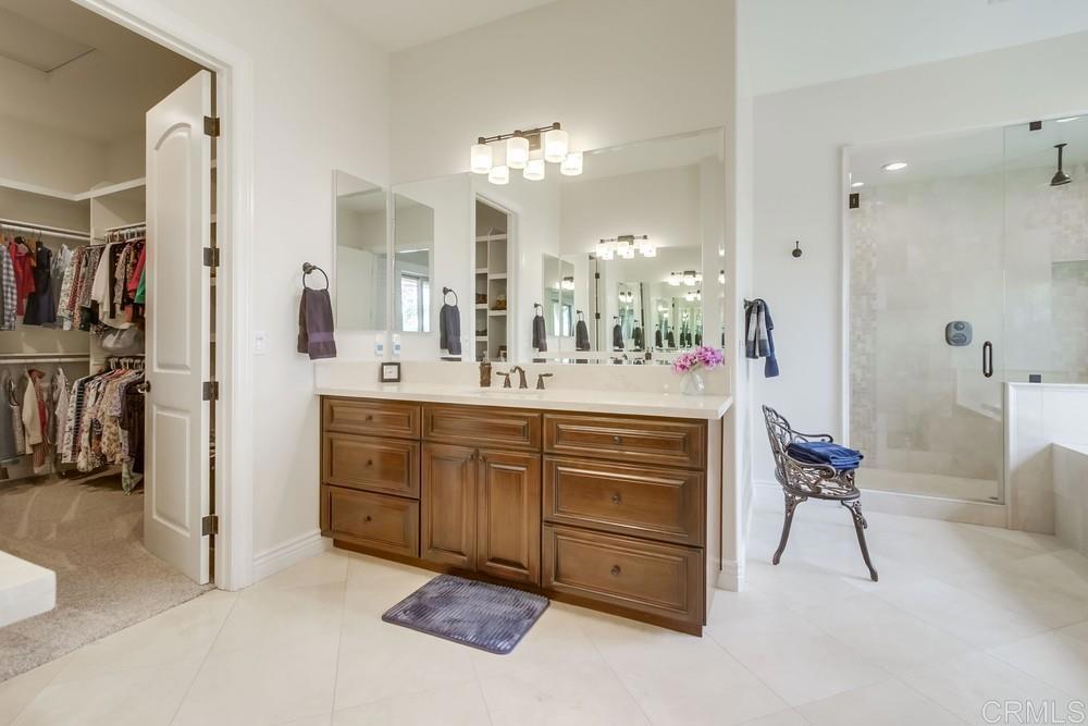 2893 Overland Passage Alpine, CA 91901 - Photo 25 of 51 a spacious bathroom with a sink double vanity and a mirror
