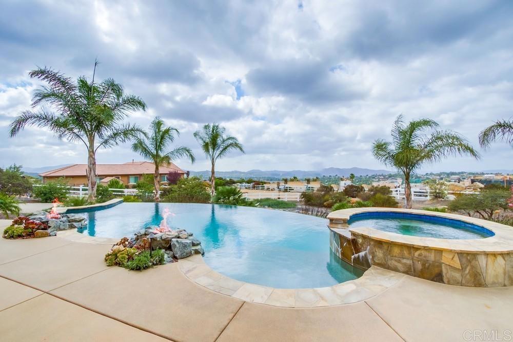 2893 Overland Passage Alpine, CA 91901 - Photo 37 of 51 a view of a swimming pool and lounge chair