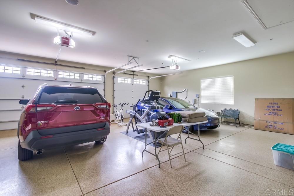 2893 Overland Passage Alpine, CA 91901 - Photo 48 of 51 a living room with furniture a flat screen tv and a couch