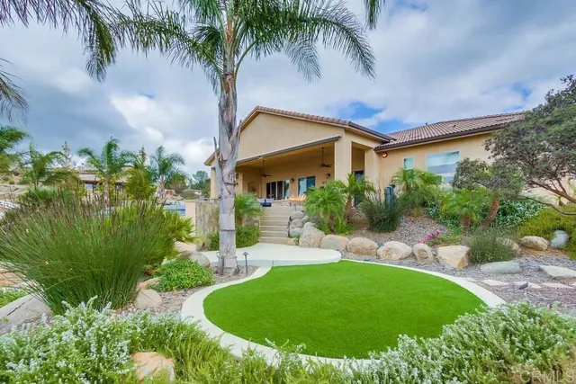 a view of a houses with a street