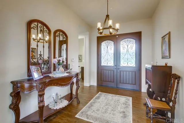 a view of a livingroom with furniture and a window