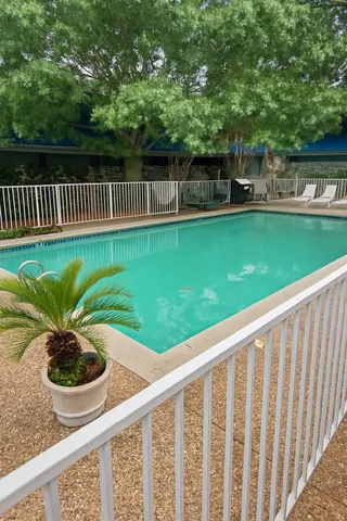 a view of a backyard with a garden