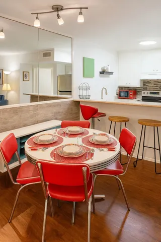 a view of a dining room with furniture