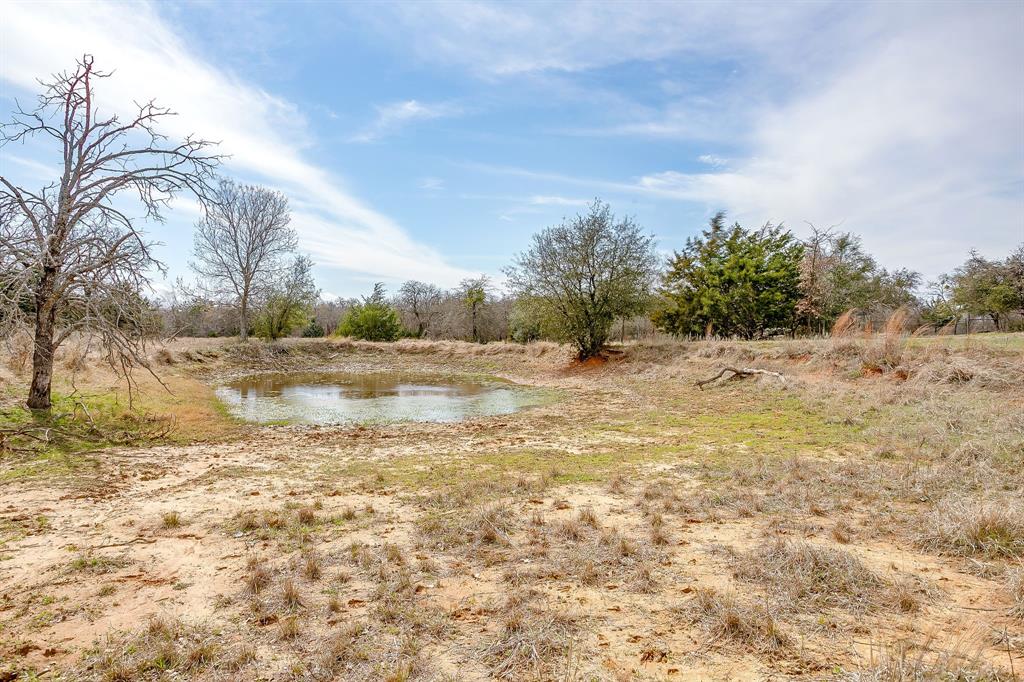 1615 Sanger Drive Springtown, TX 76082 - Photo 37 of 40 a view of beach and lake