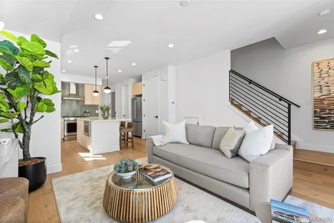 a bedroom with a bed and a lamp