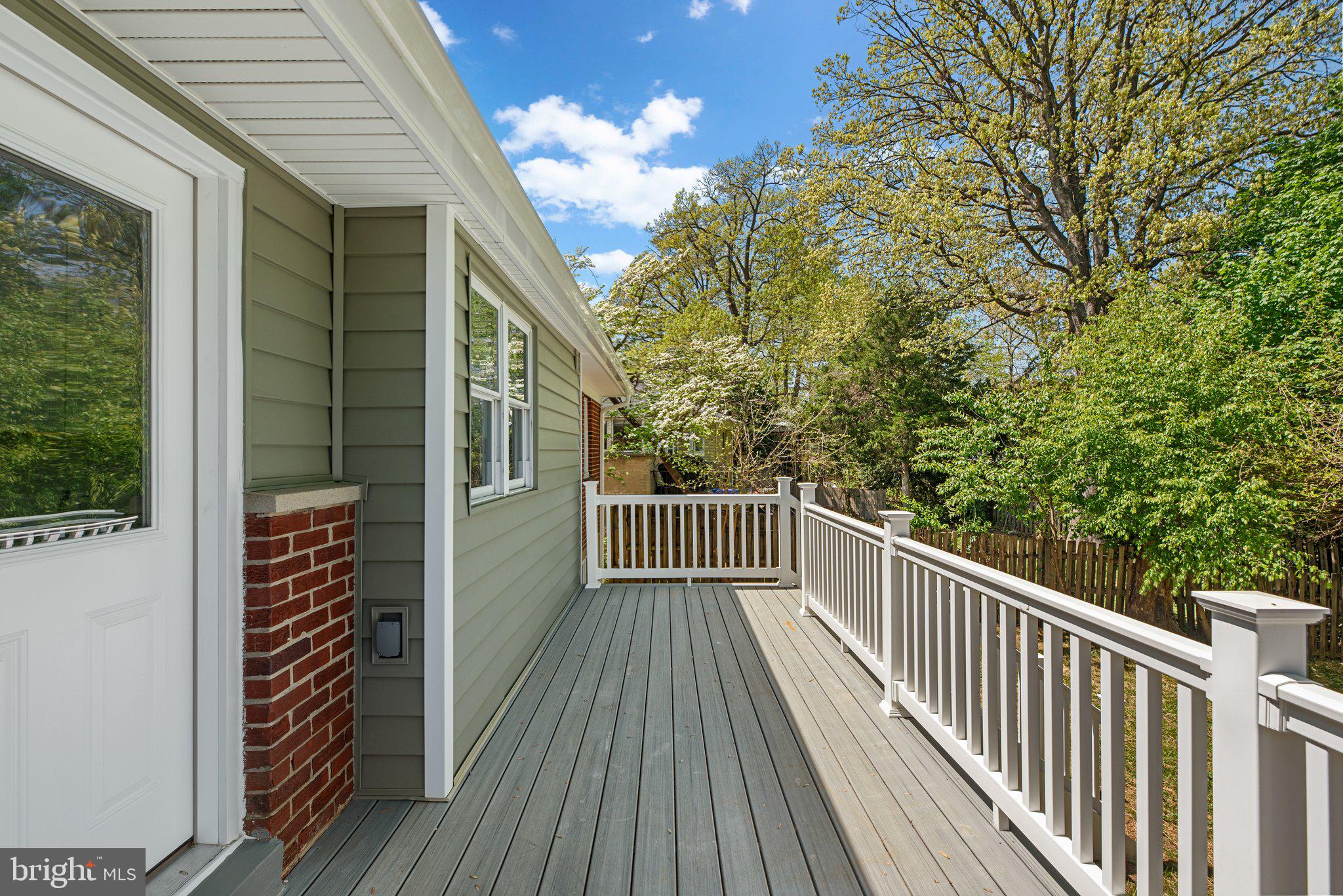 10126 Renfrew Road Silver Spring, MD 20901 - Photo 11 of 40 a view of balcony with wooden floor and fence