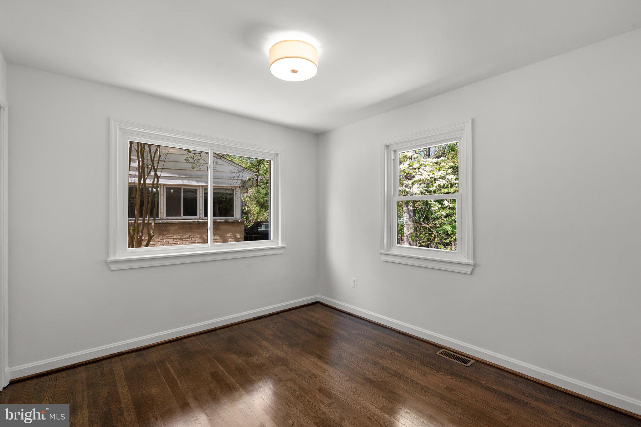 10126 Renfrew Road Silver Spring, MD 20901 - Photo 20 of 40 an empty room with a window