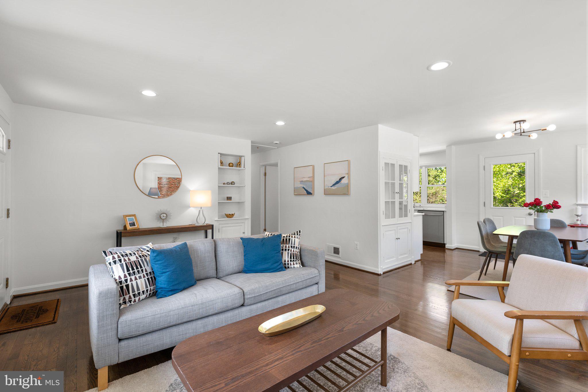 10126 Renfrew Road Silver Spring, MD 20901 - Photo 2 of 40 a living room with furniture and wooden floor