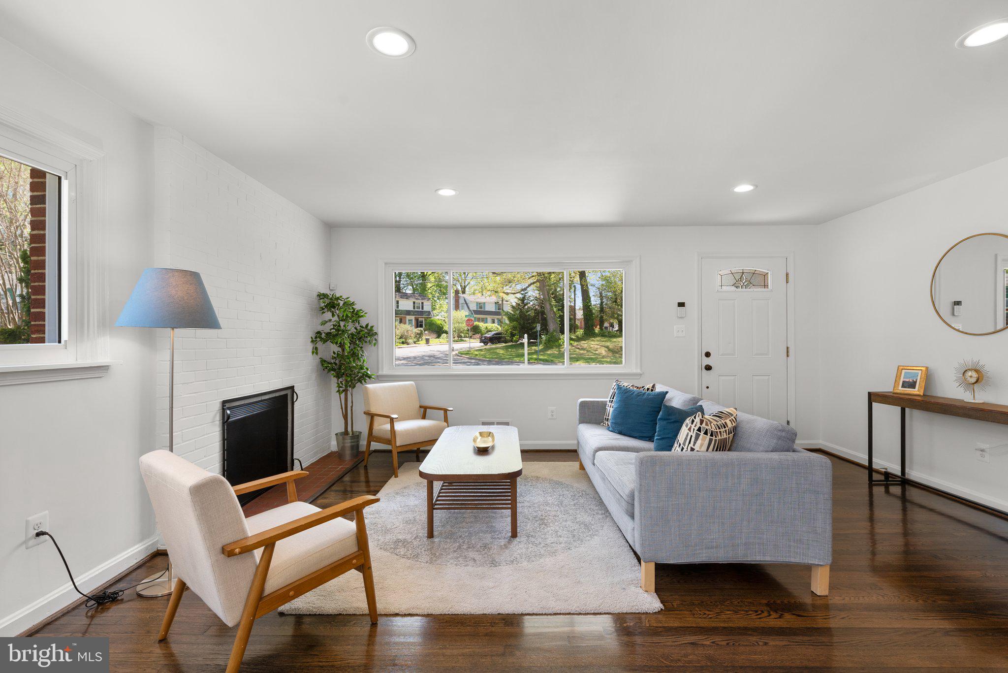 10126 Renfrew Road Silver Spring, MD 20901 - Photo 3 of 40 a living room with furniture and a large window