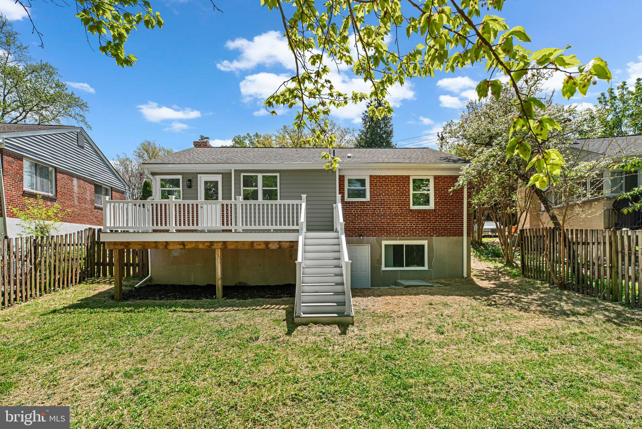 10126 Renfrew Road Silver Spring, MD 20901 - Photo 34 of 40 a front view of a house with a garden