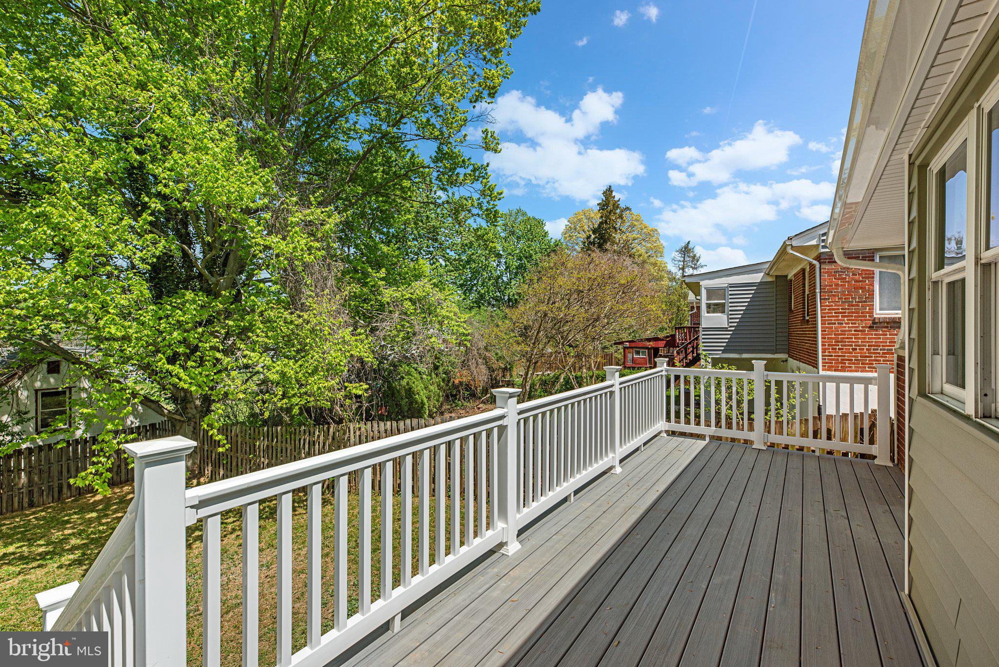 10126 Renfrew Road Silver Spring, MD 20901 - Photo 5 of 40 a view of a balcony with wooden floor
