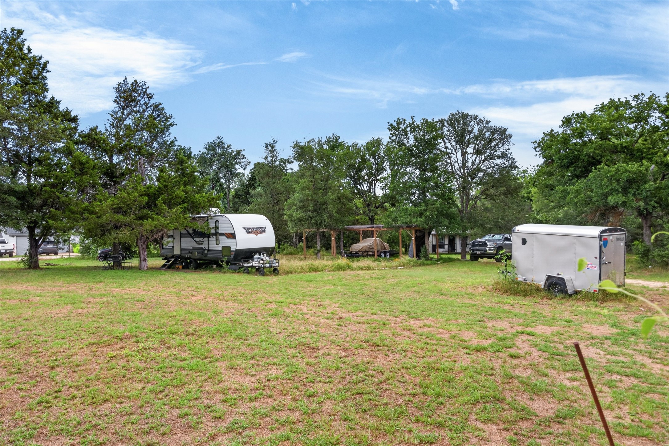266 Beaver Road Elgin, TX 78621 - Photo 10 of 40 A spacious lot provides ample room for outdoor activities and potential expansion.