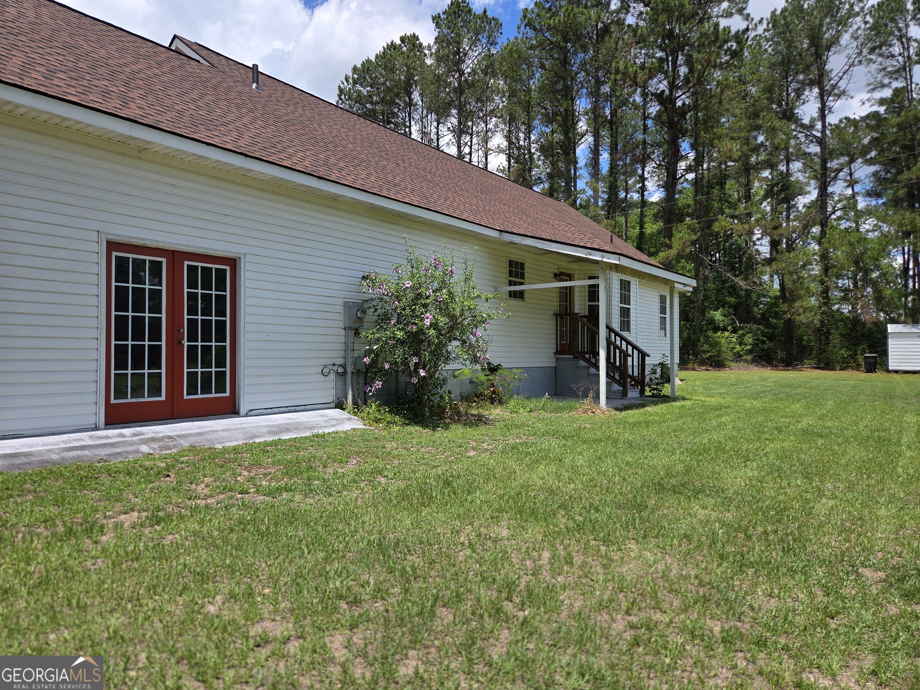 9546 Union Road Metter, GA 30439 - Photo 38 of 45 a view of a house with backyard and garden