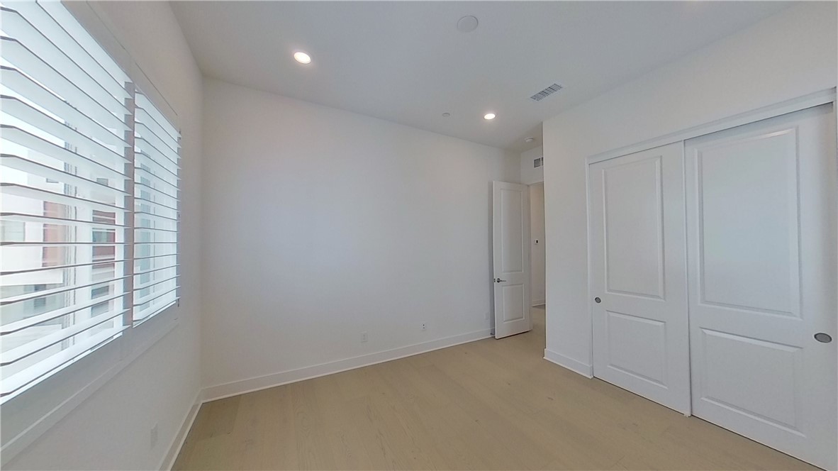 106 Yugen Irvine, CA 92618 - Photo 13 of 28 a view of an empty room and a window