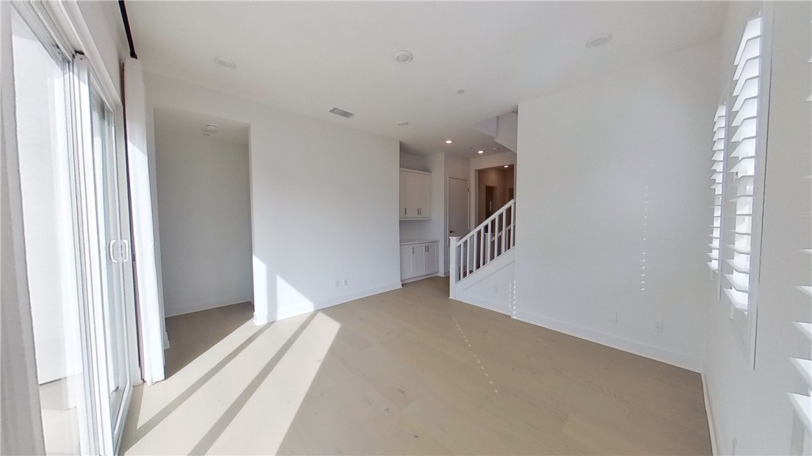 106 Yugen Irvine, CA 92618 - Photo 16 of 28 a view of a hallway view with staircase