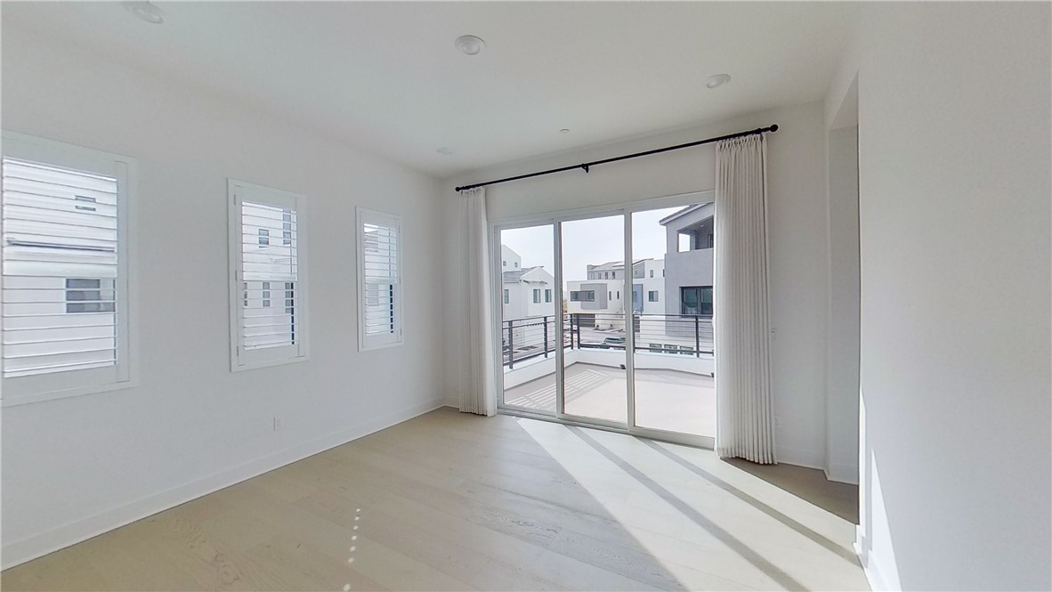 106 Yugen Irvine, CA 92618 - Photo 17 of 28 a view of an empty room with a window