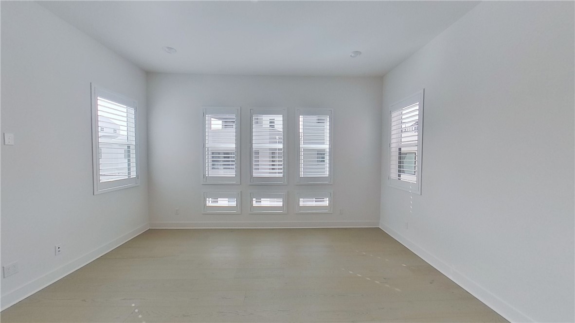 106 Yugen Irvine, CA 92618 - Photo 19 of 28 a view of an empty room with a window
