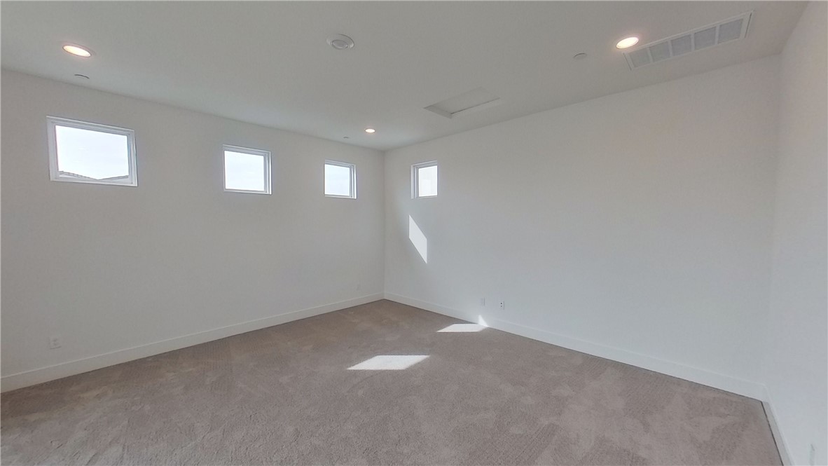 106 Yugen Irvine, CA 92618 - Photo 23 of 28 a view of an empty room with a window