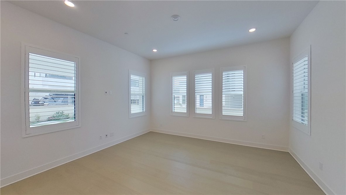 106 Yugen Irvine, CA 92618 - Photo 9 of 28 a view of an empty room with a window