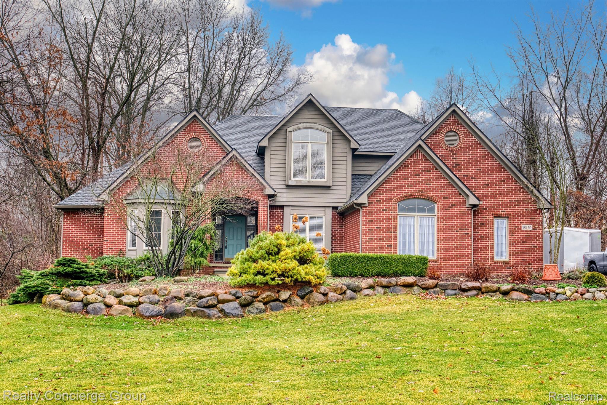 9514 Quail Ridge Run Brighton, MI 48114 - Photo 1 of 37 Welcome home to this sprawling brick Contemporary