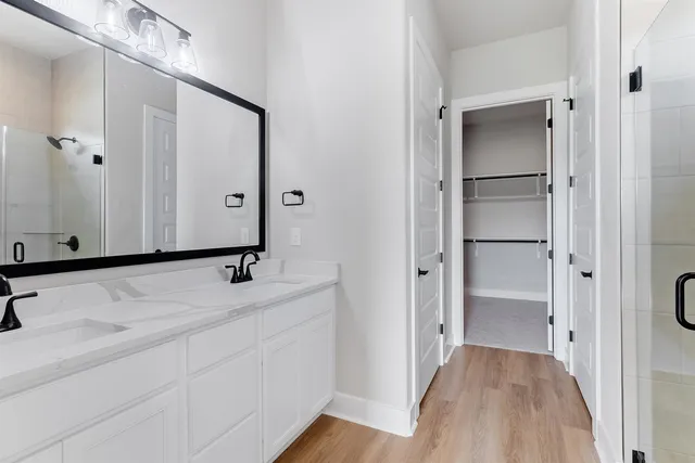a bathroom with a sink and mirror