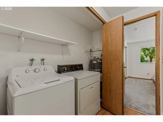a bathroom with a shower and a sink