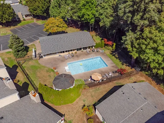 an aerial view of a house with a garden